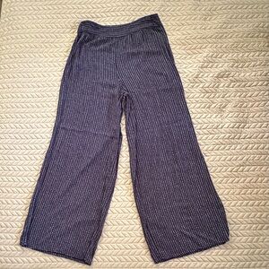 NWOT O’Neill flowy navy pants with white dots.